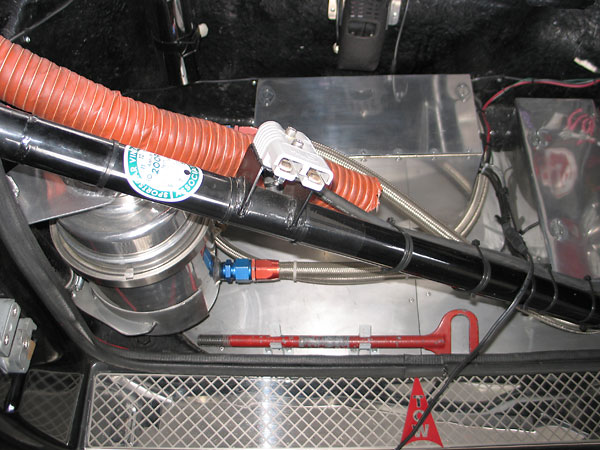 Foreground: quick connection for jump starting. Below: detachable tow hook.