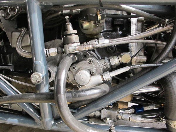 A mechanical tachometer is driven by cable off the end of the oil pump.