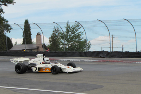 Denny Hulme's McLaren M23 returned to race at Watkins Glen in 2011