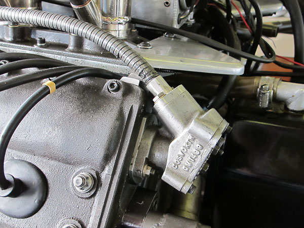 A high pressure mechanical fuel pump is driven via cable from one of the four camshafts.
