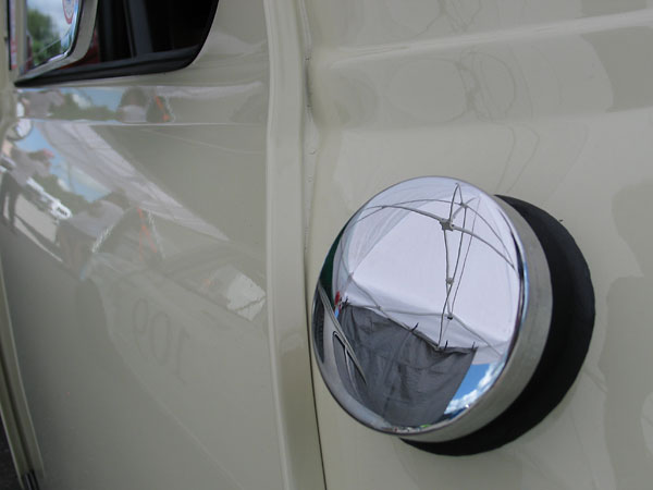 Polished stainless steel fuel filler cap.