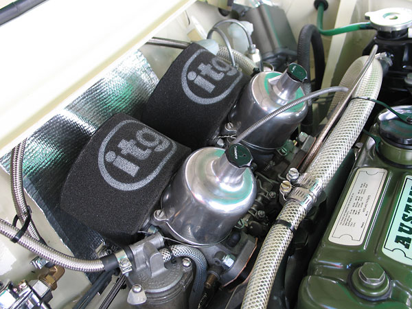 Dual S.U. HS4 (AUD 135F and AUD 135R) carburetors. ITG foam air filters.