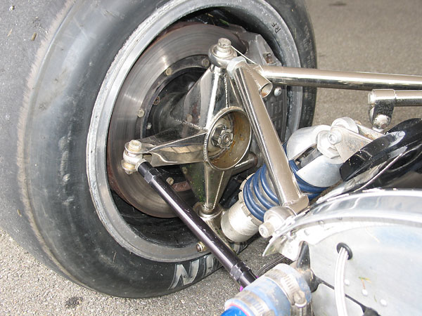 Fabricated steel front suspension upright. AP 6-pot calipers with 1.125 inch ventilated rotors.