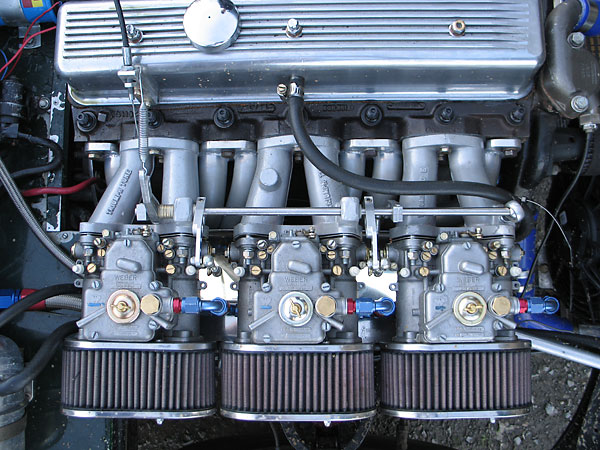 Triple Weber 40DCOE carbs with K&N air filters, mounted on Triumphtune intake manifolds.