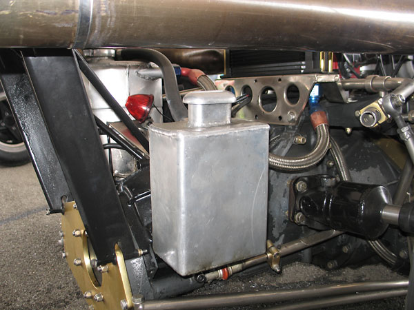 Custom aluminum oil catch tank and breather.