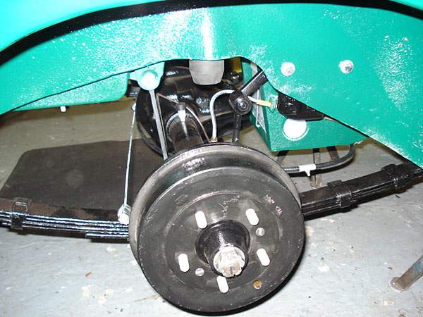 Stock drum brakes. Note: MGC featured five-lug wheels.