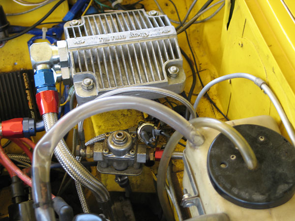 Oberg Tattle Tale oil filter. (Foreground: fuel pressure regulator.)
