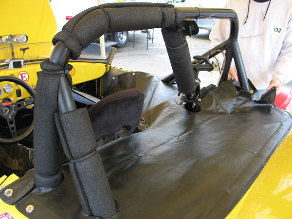 Five point roll cage, surrounded by a specially constructed tonneau cover.