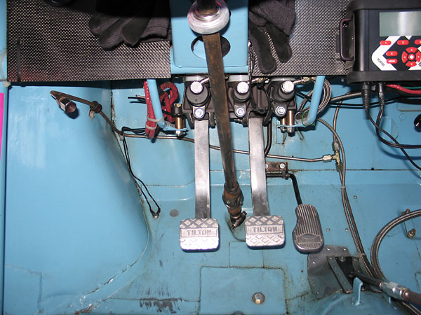 Tilton pedal assembly with dual Tilton master cylinders. Paddy Hopkirk throttle pedal pad.