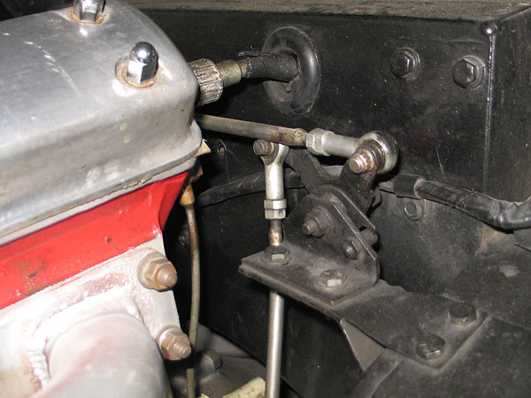 Above the throttle linkage you can see the cam-driven cable for the Smiths rev-counter gauge.