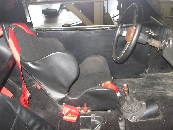 Kirkey aluminum racing seat. OMP six-point cam-lock safety harness.