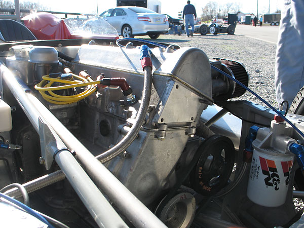 The vertical bracket on the long frame tube at left was originally provided for the ignition coil.