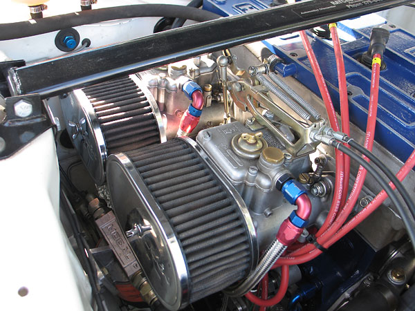 Dual Weber DCOE carburetors with K&N gauze air filters.